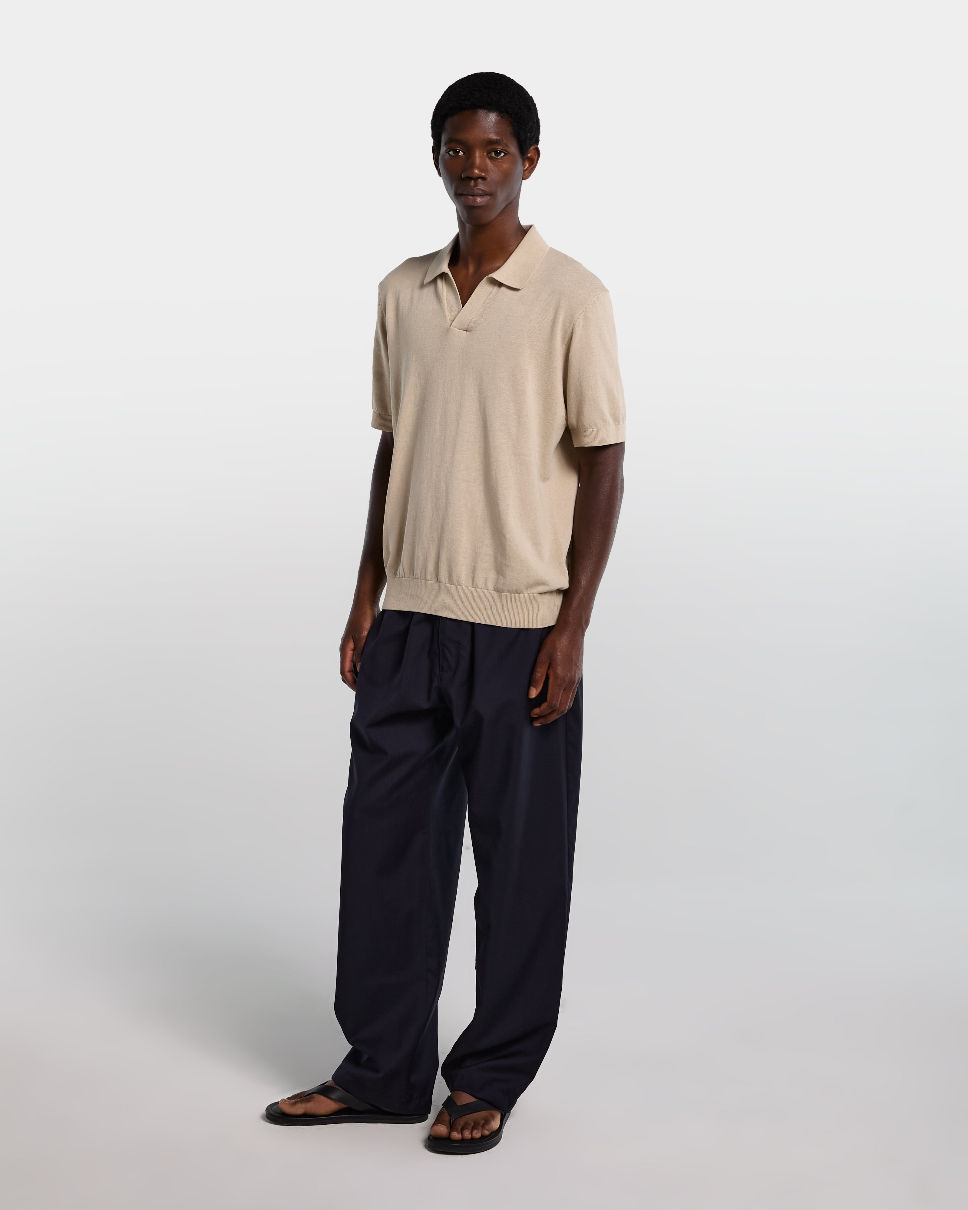 Sand-colored cotton polo shirt with open collar