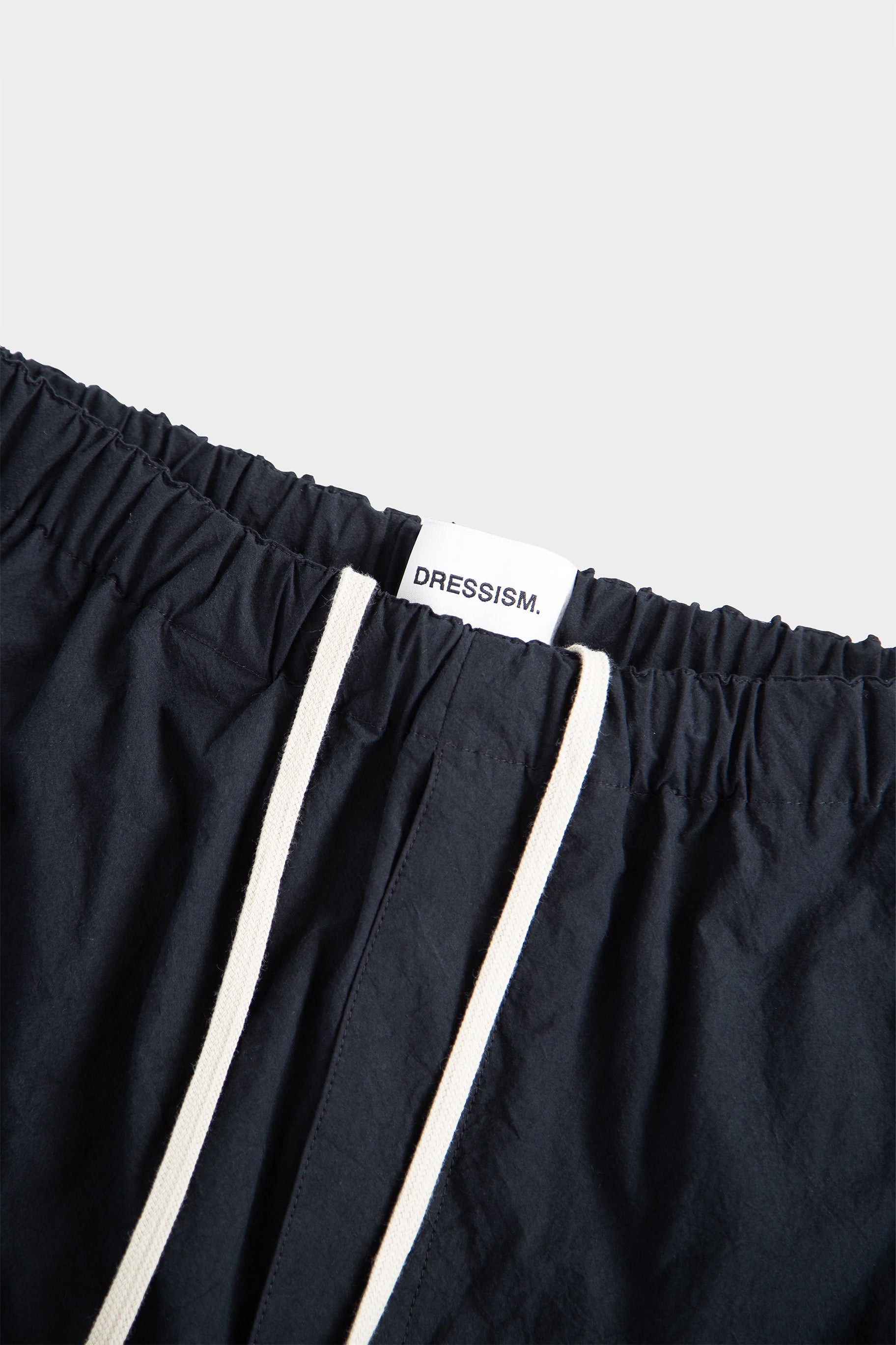 Black cotton poplin loose-fit trousers