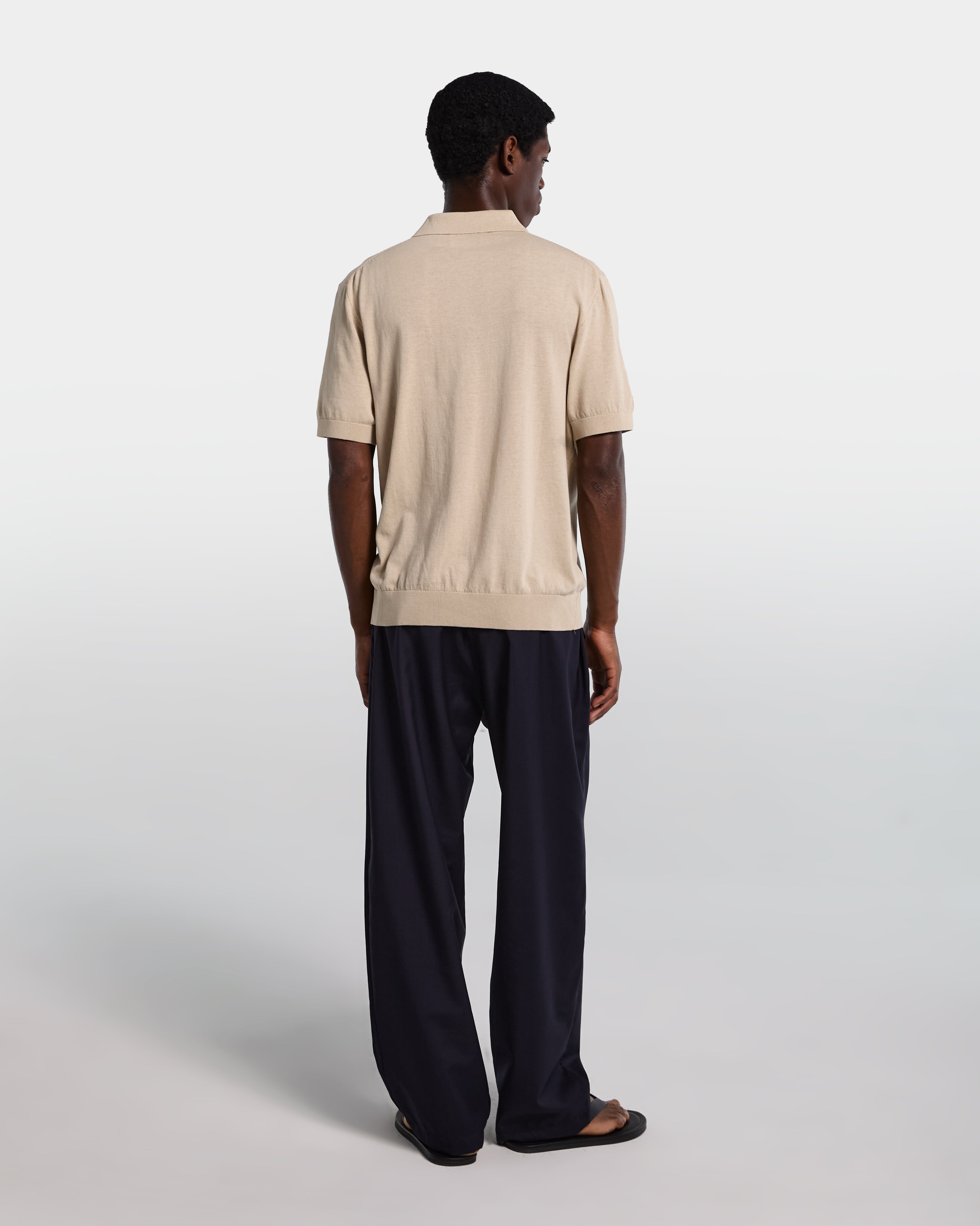 Sand-colored cotton polo shirt with open collar