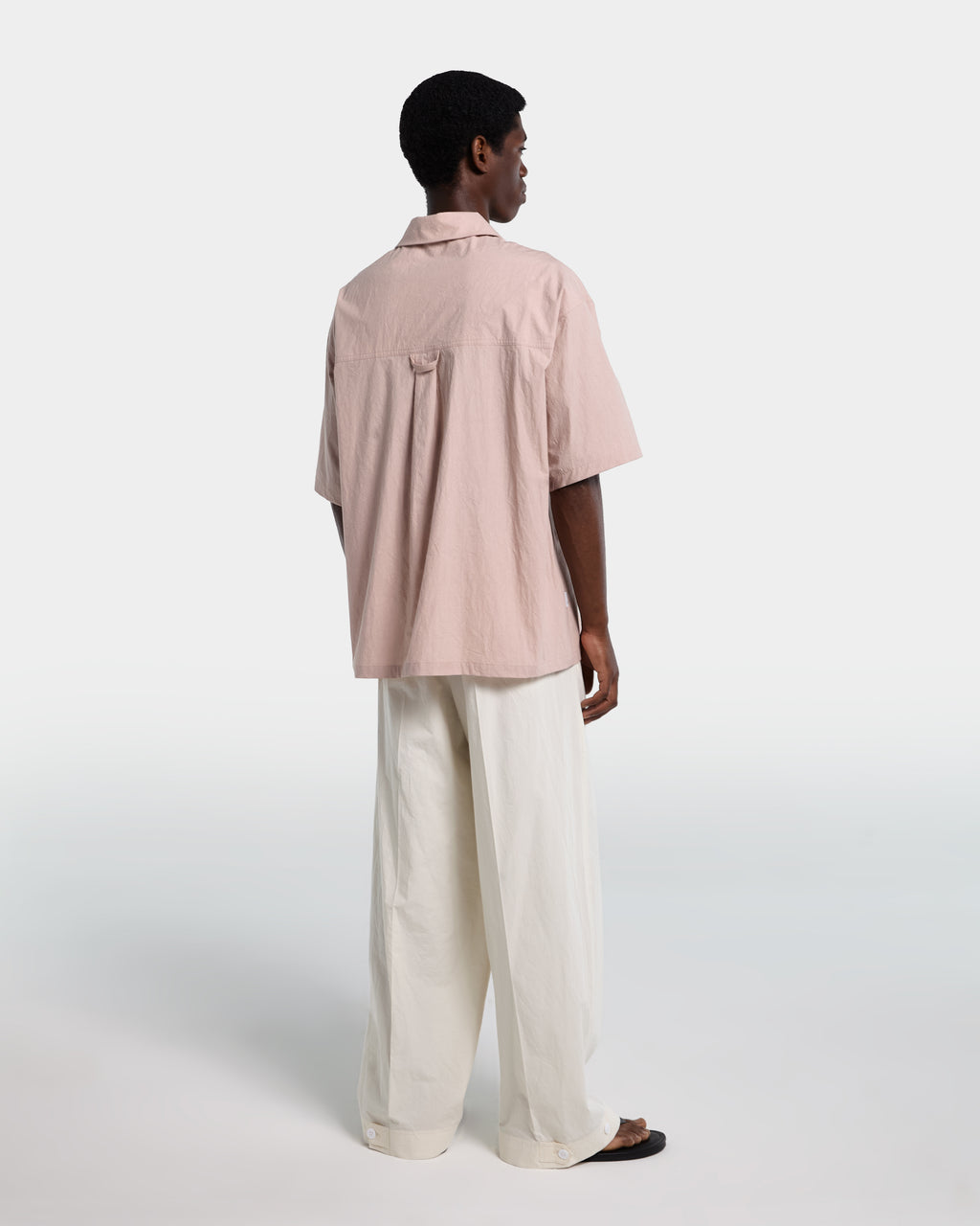 Pink poplin shirt with zip and short sleeves