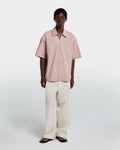 Pink poplin shirt with zip and short sleeves