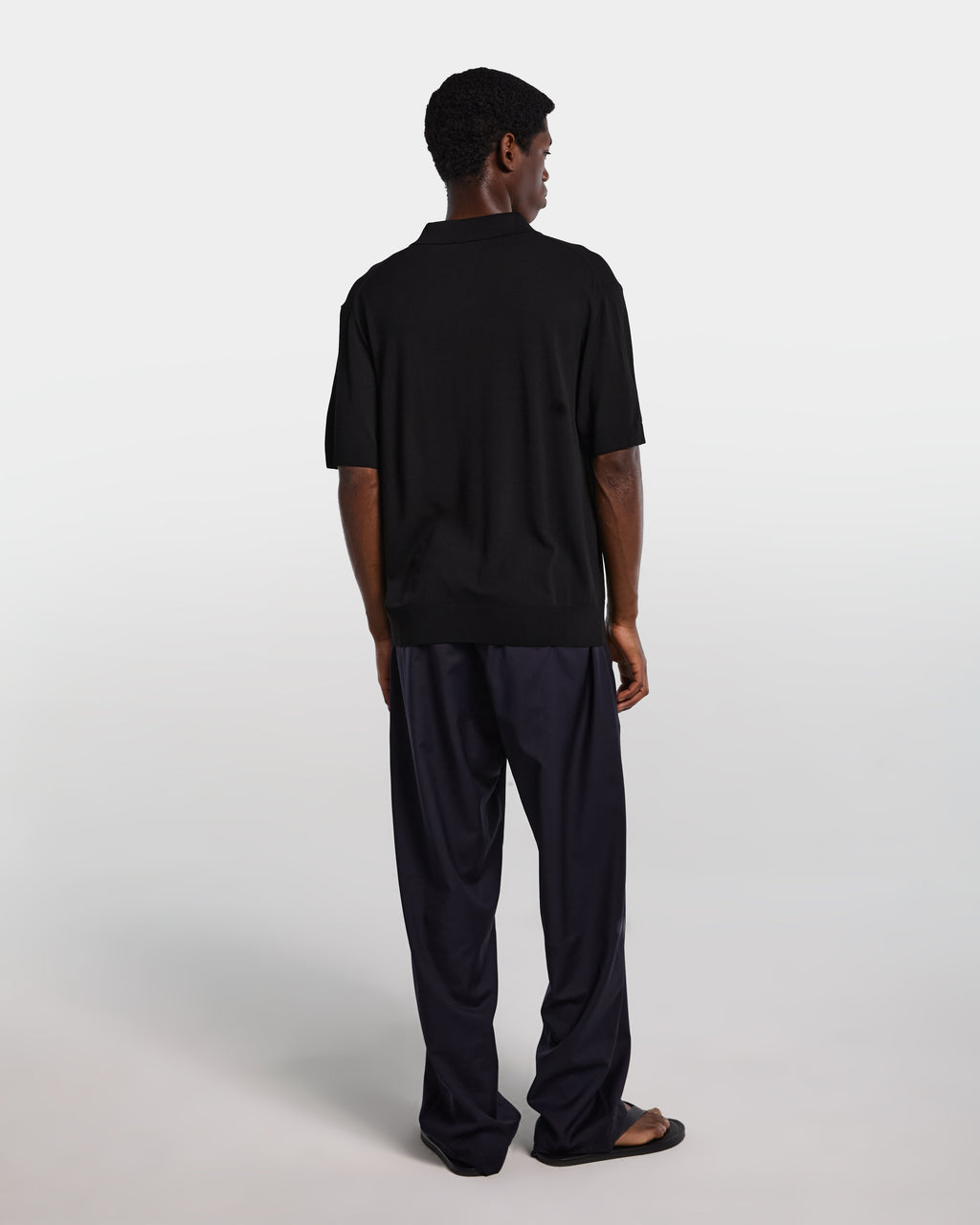 Black viscose polo shirt with open collar