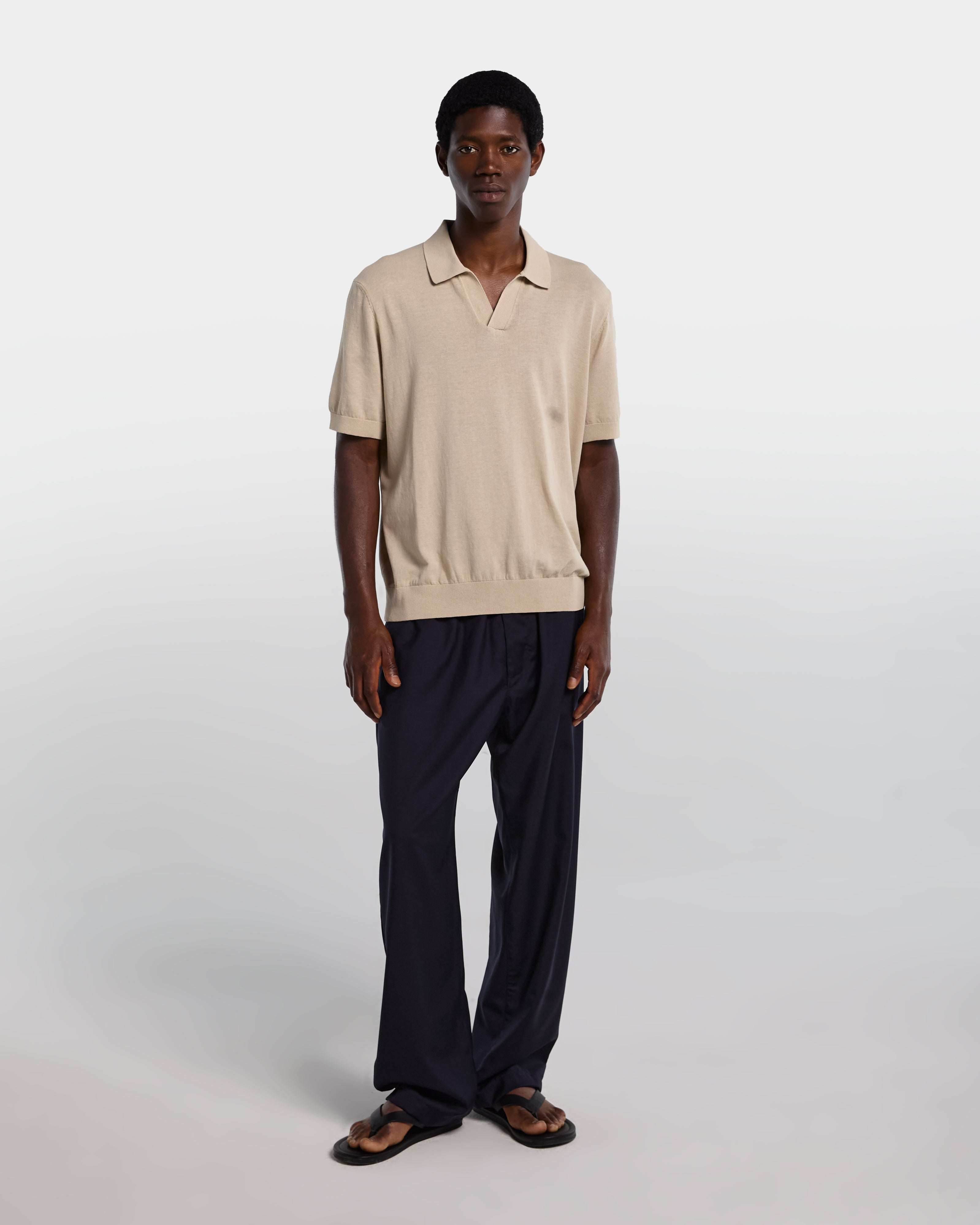 Sand-colored cotton polo shirt with open collar