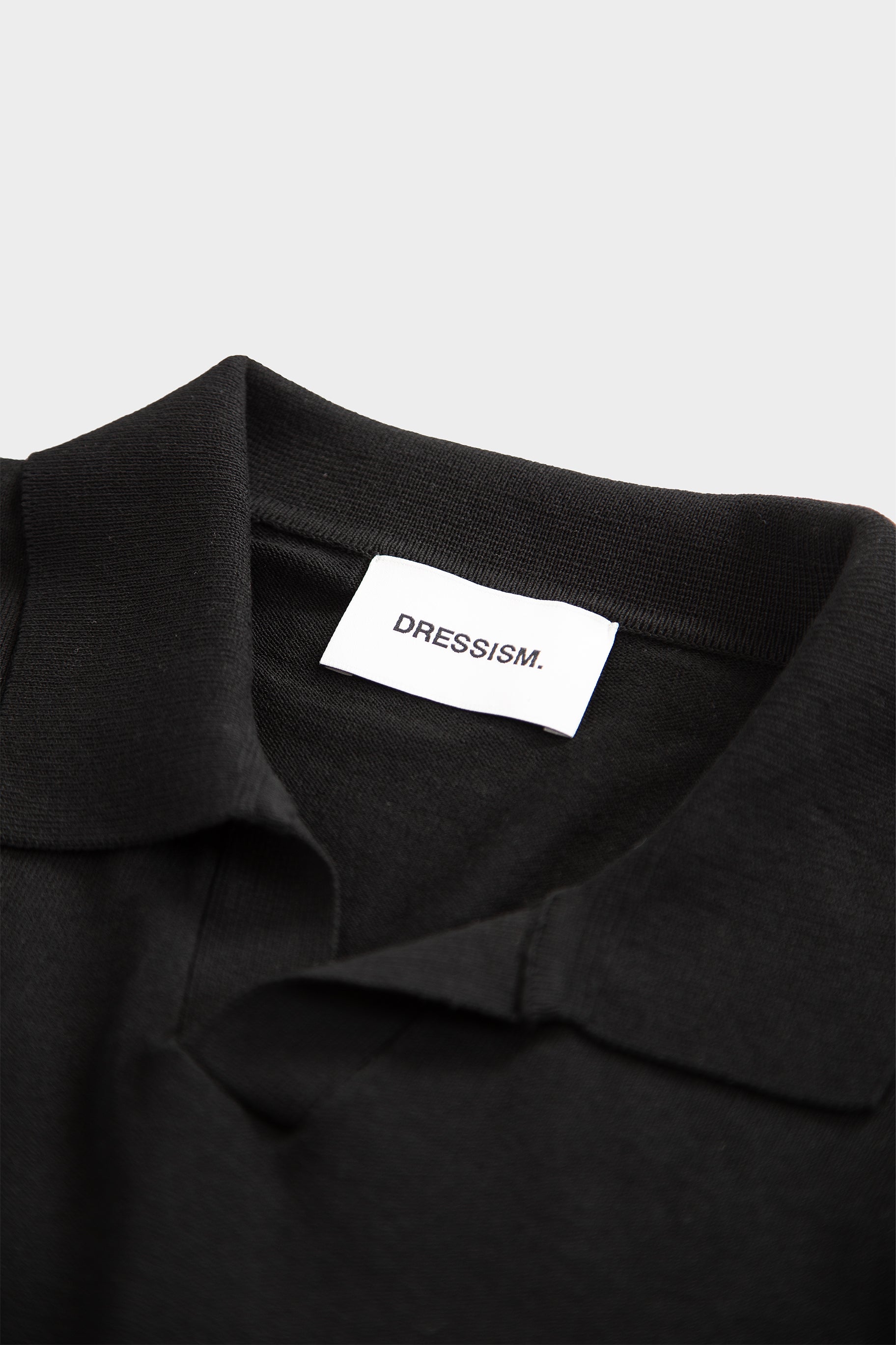 Black viscose polo shirt with open collar