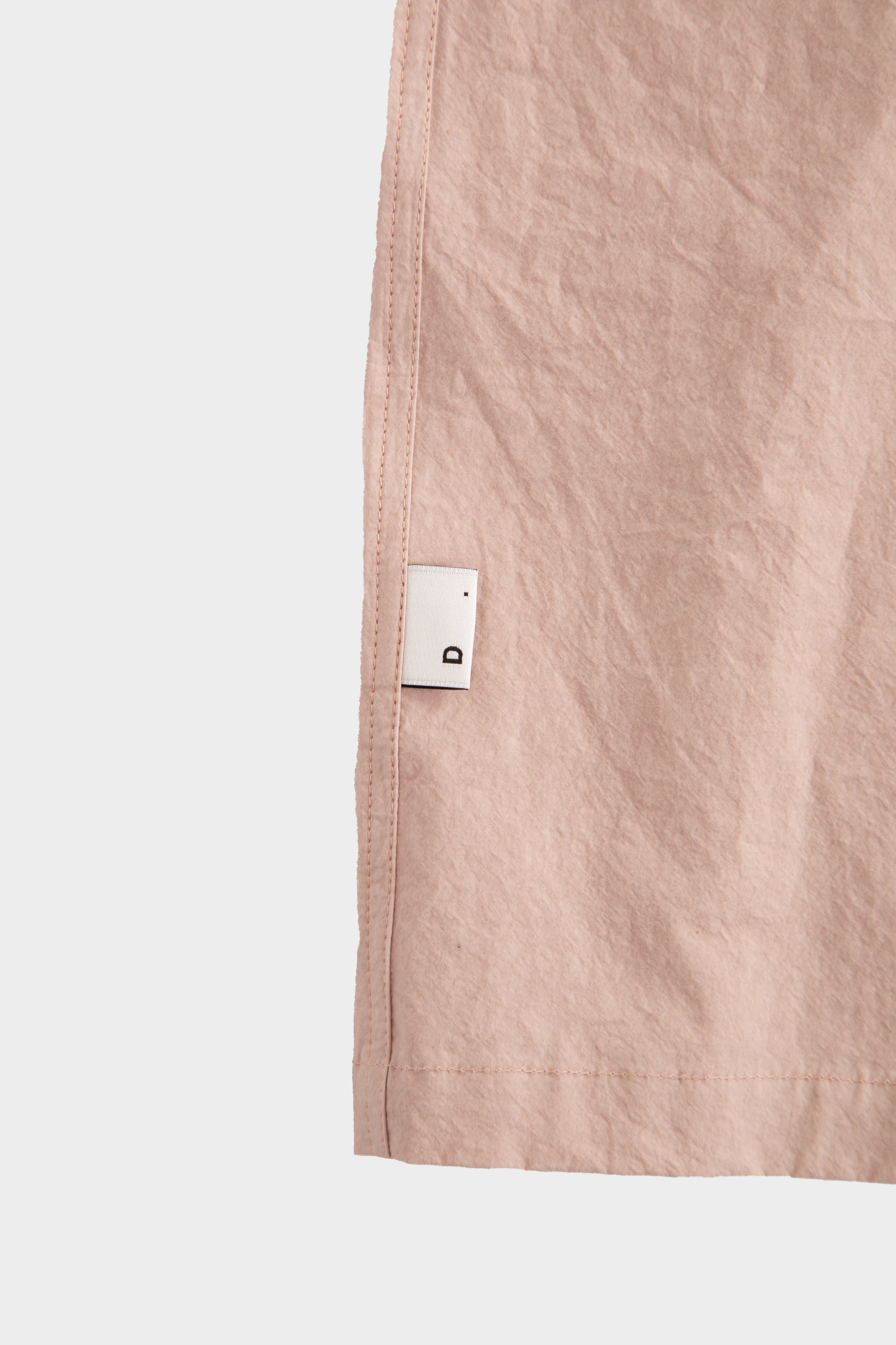 Pink poplin shirt with zip and short sleeves