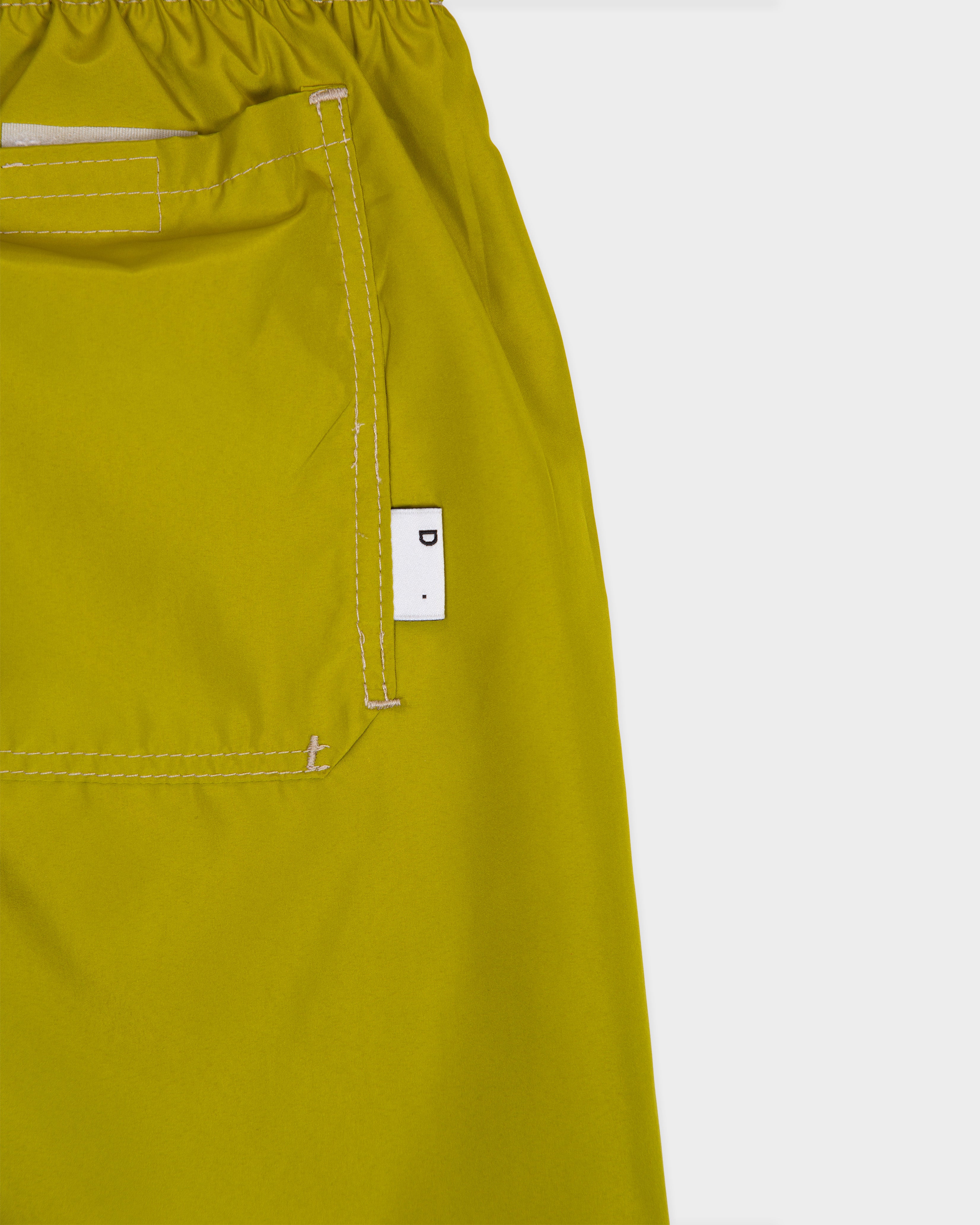 Lime green nylon swim shorts