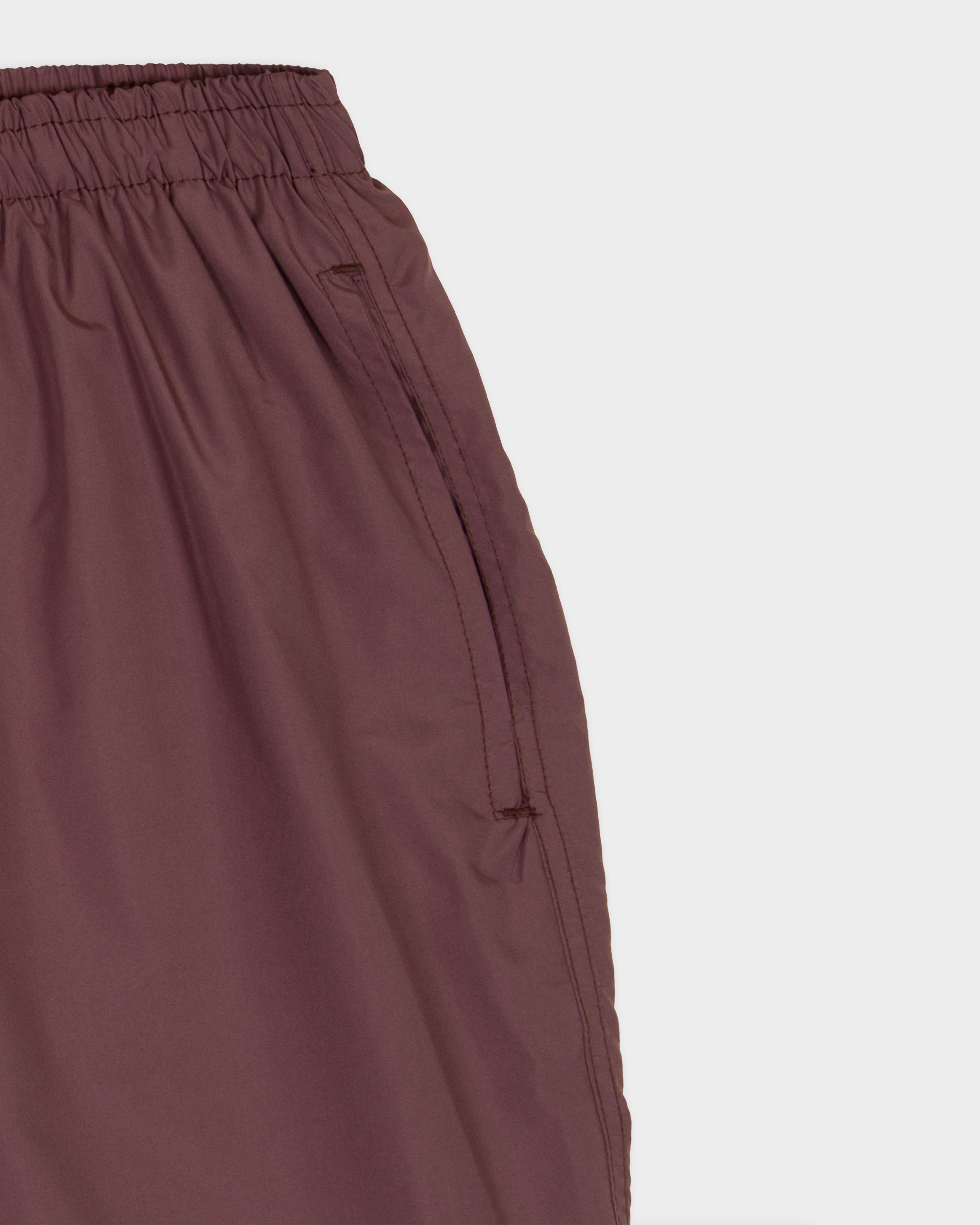 Mauve nylon swimming shorts