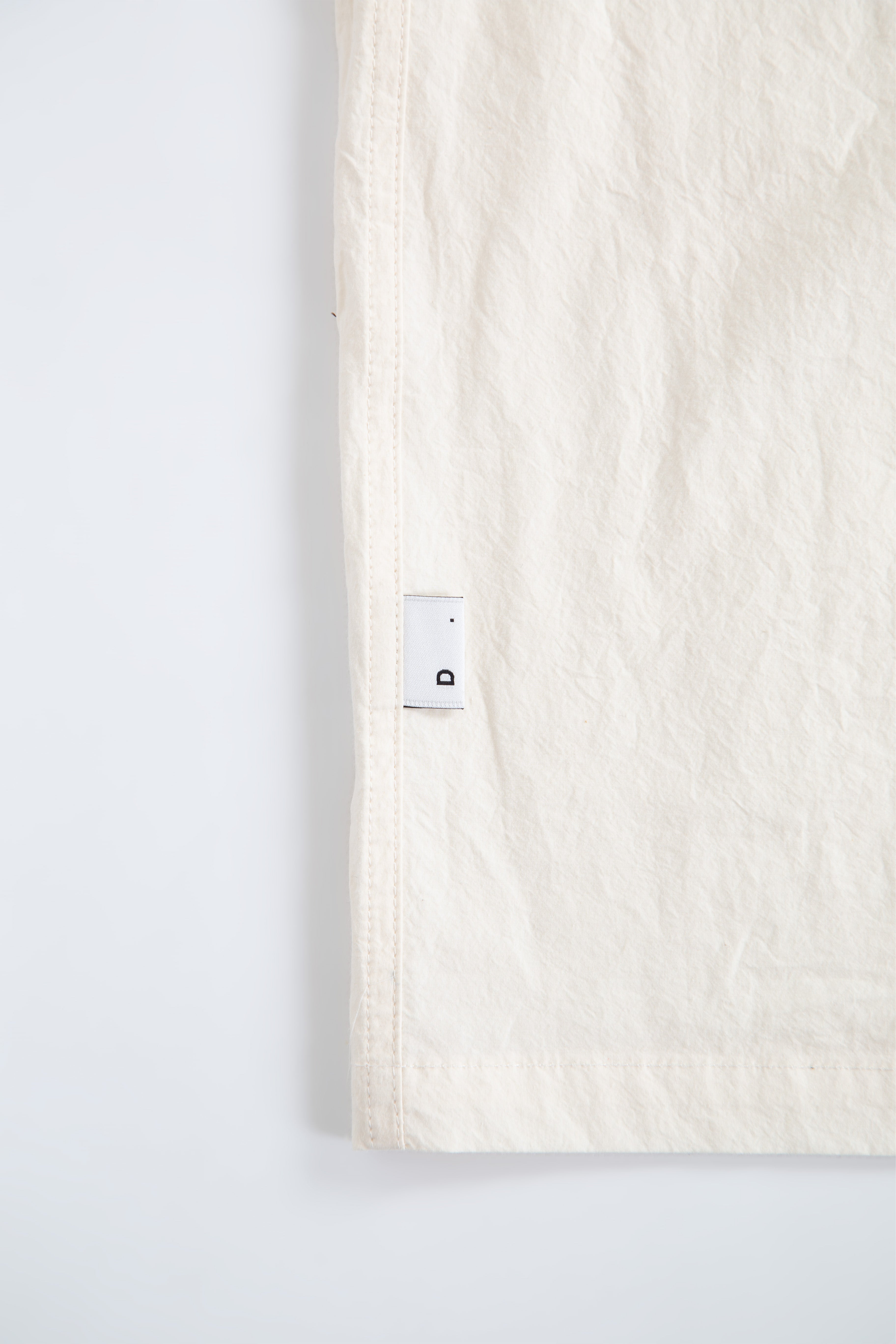 Cream poplin shirt with zip and short sleeves