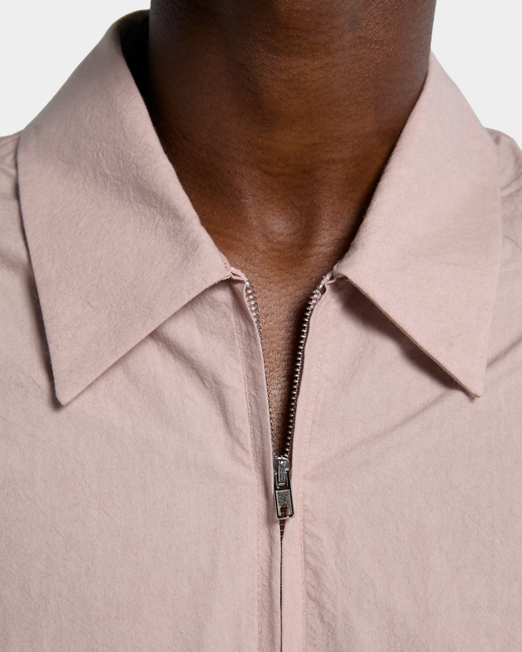 Pink poplin shirt with zip and short sleeves