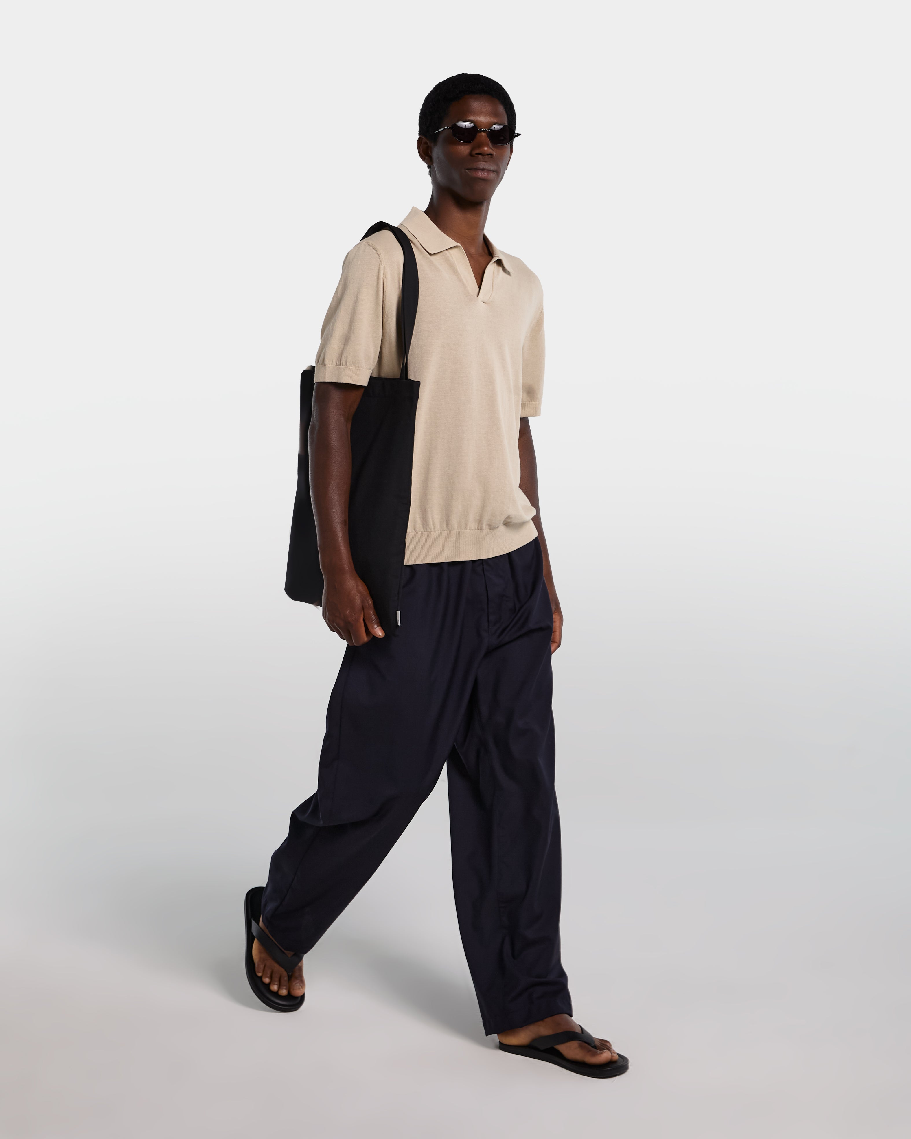 Sand-colored cotton polo shirt with open collar