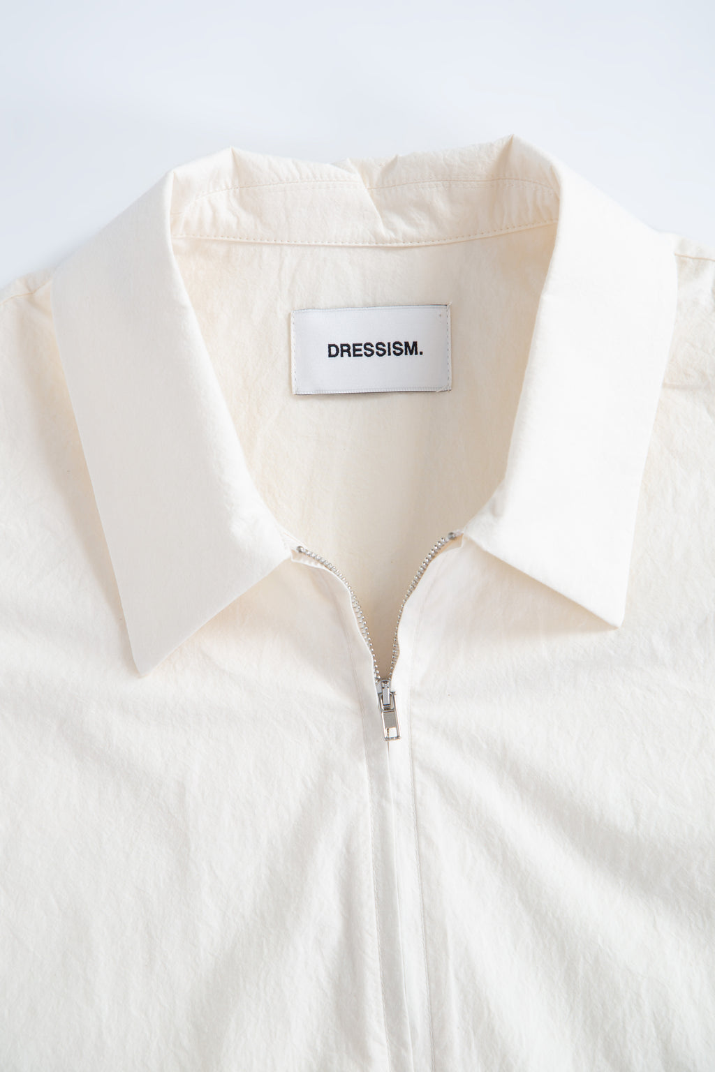 Cream poplin shirt with zip and short sleeves
