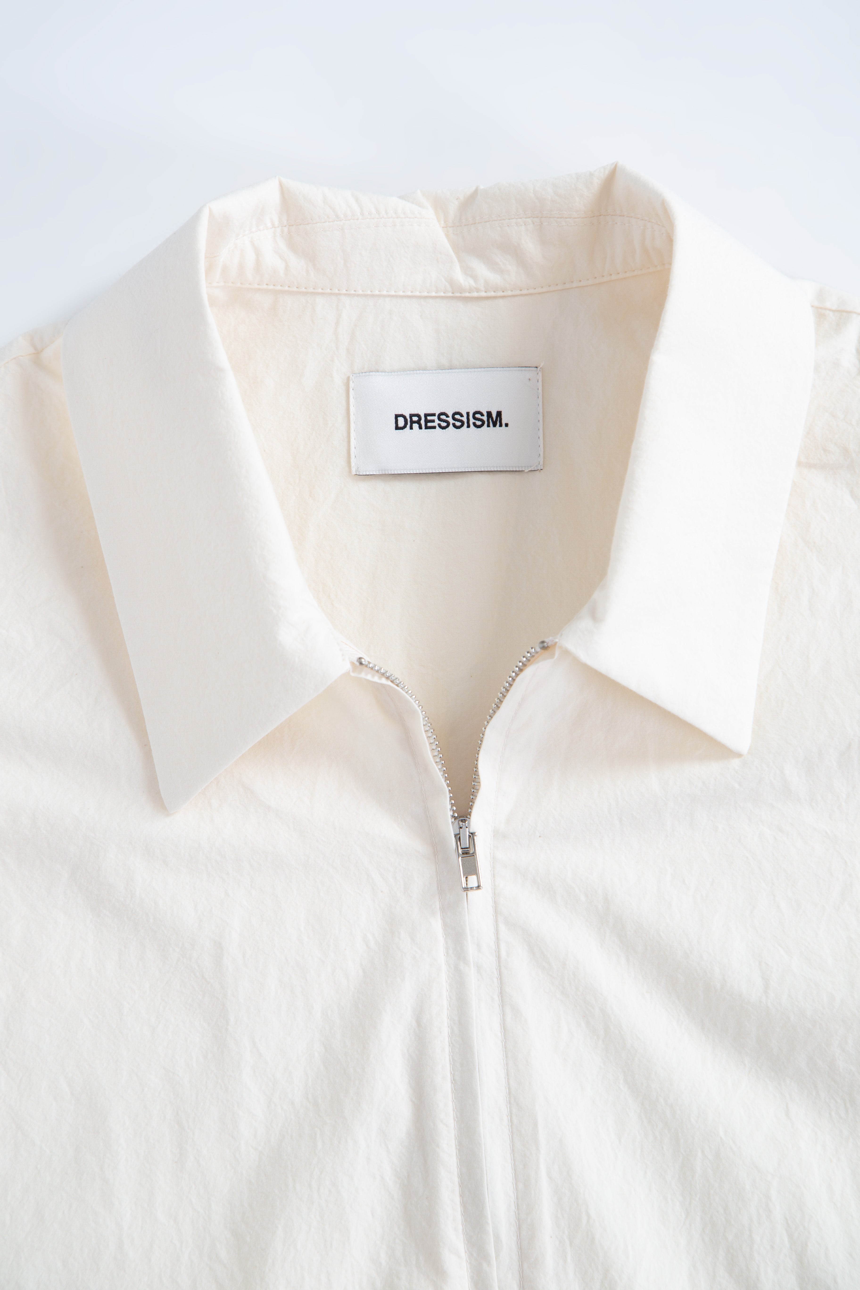 Cream poplin shirt with zip and short sleeves