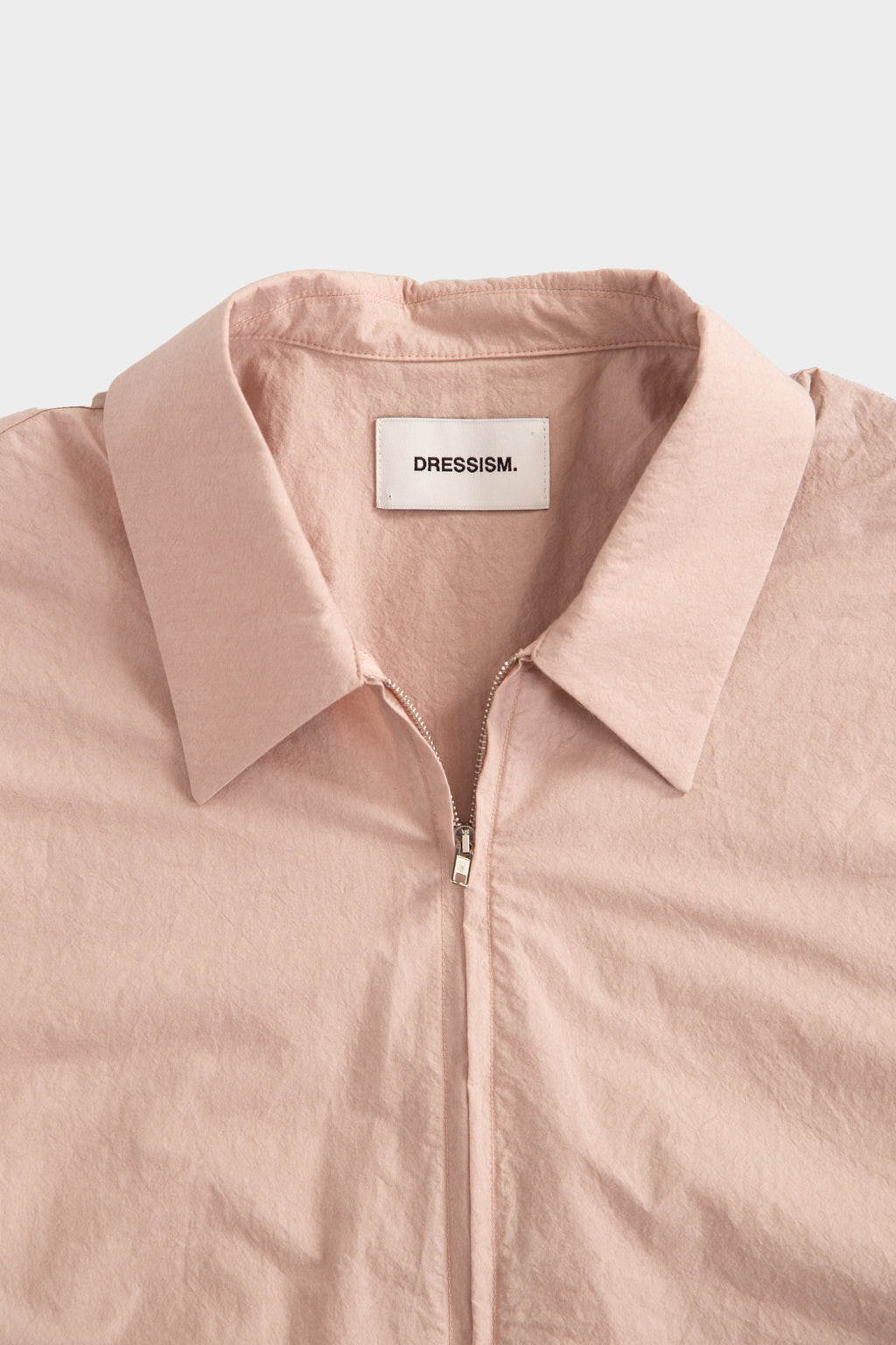 Pink poplin shirt with zip and short sleeves