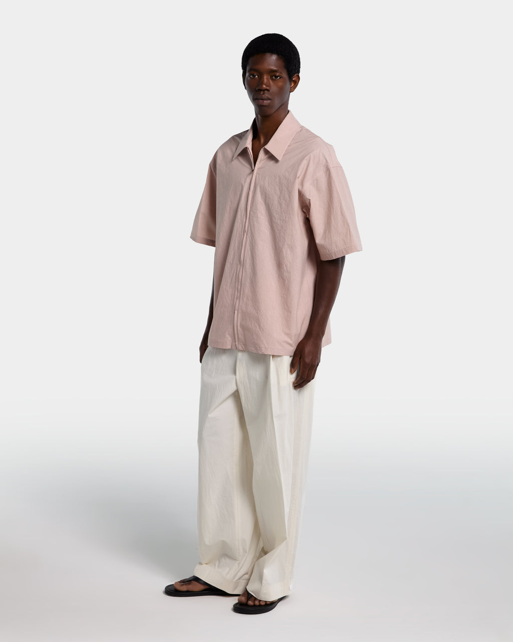 Pink poplin shirt with zip and short sleeves